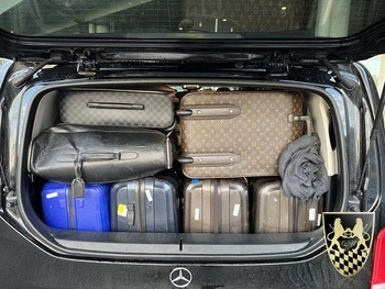 An English-speaking chauffeur ready to assist at Munich airport.